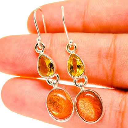 Sterling silver drop earrings with yellow teardrop citrine and orange round gemstones