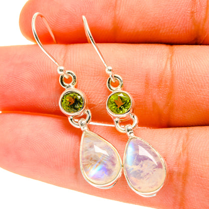Sterling silver drop earrings with green peridot and iridescent moonstone teardrops