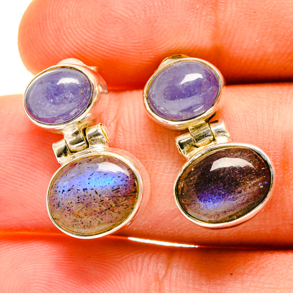 Silver drop earrings with round purple gemstones and oval iridescent stones