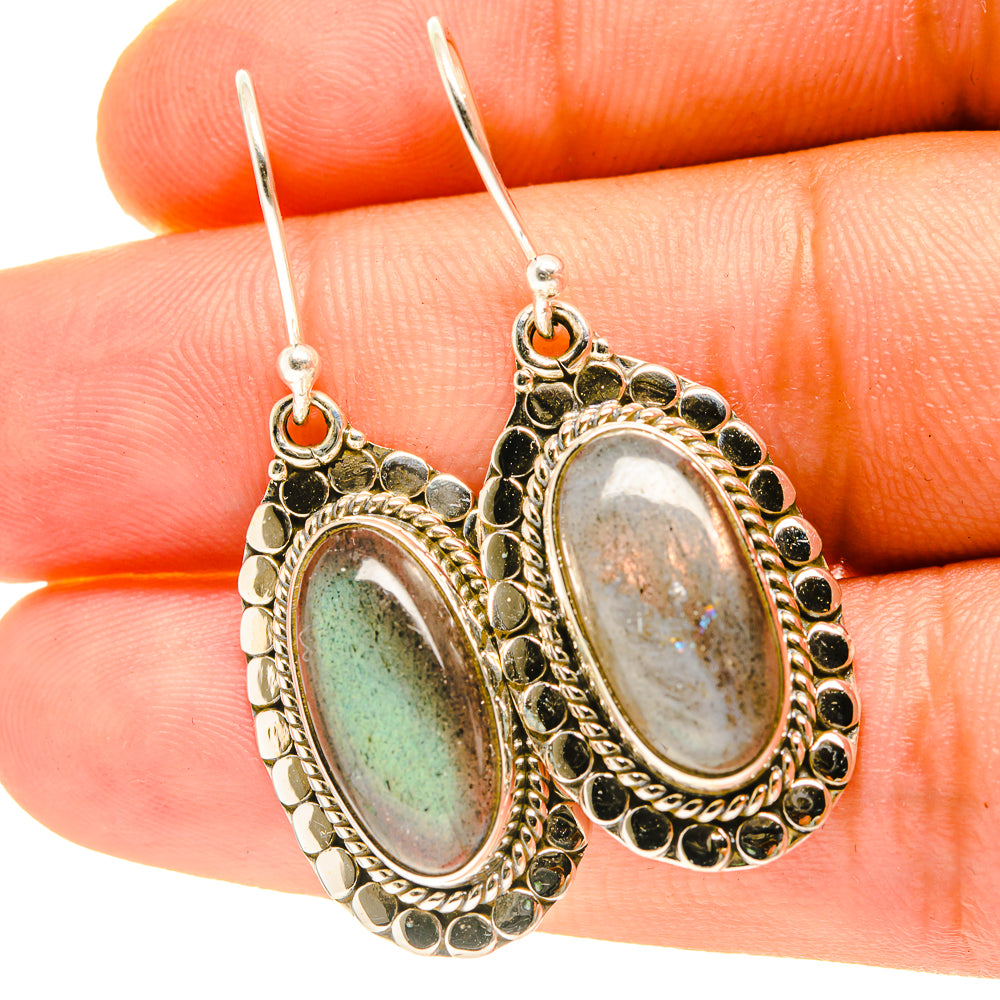 Oval labradorite drop earrings in sterling silver-tone, ornate bezel with fishhook backs