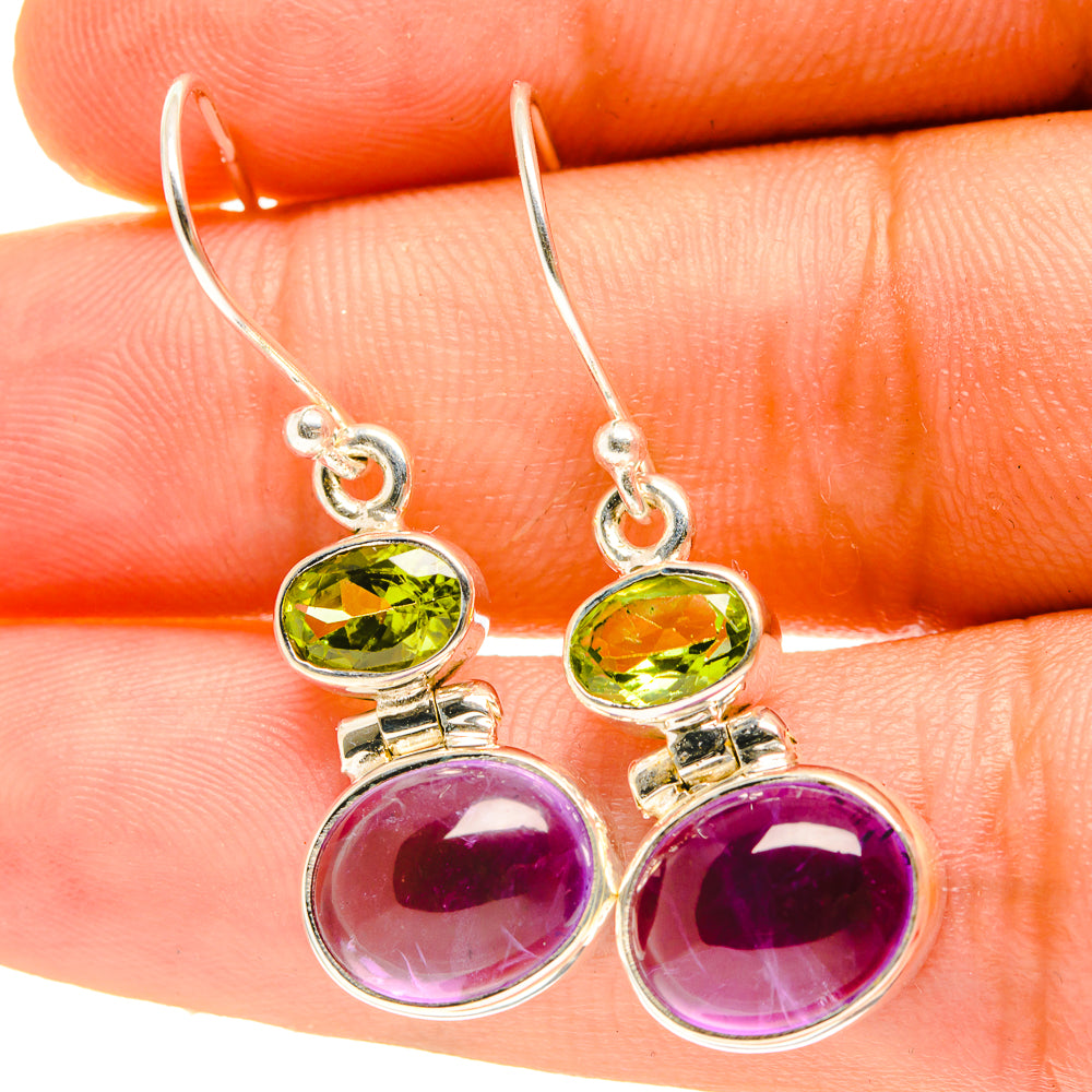 Sterling silver dangle earrings with green peridot and purple amethyst round stones