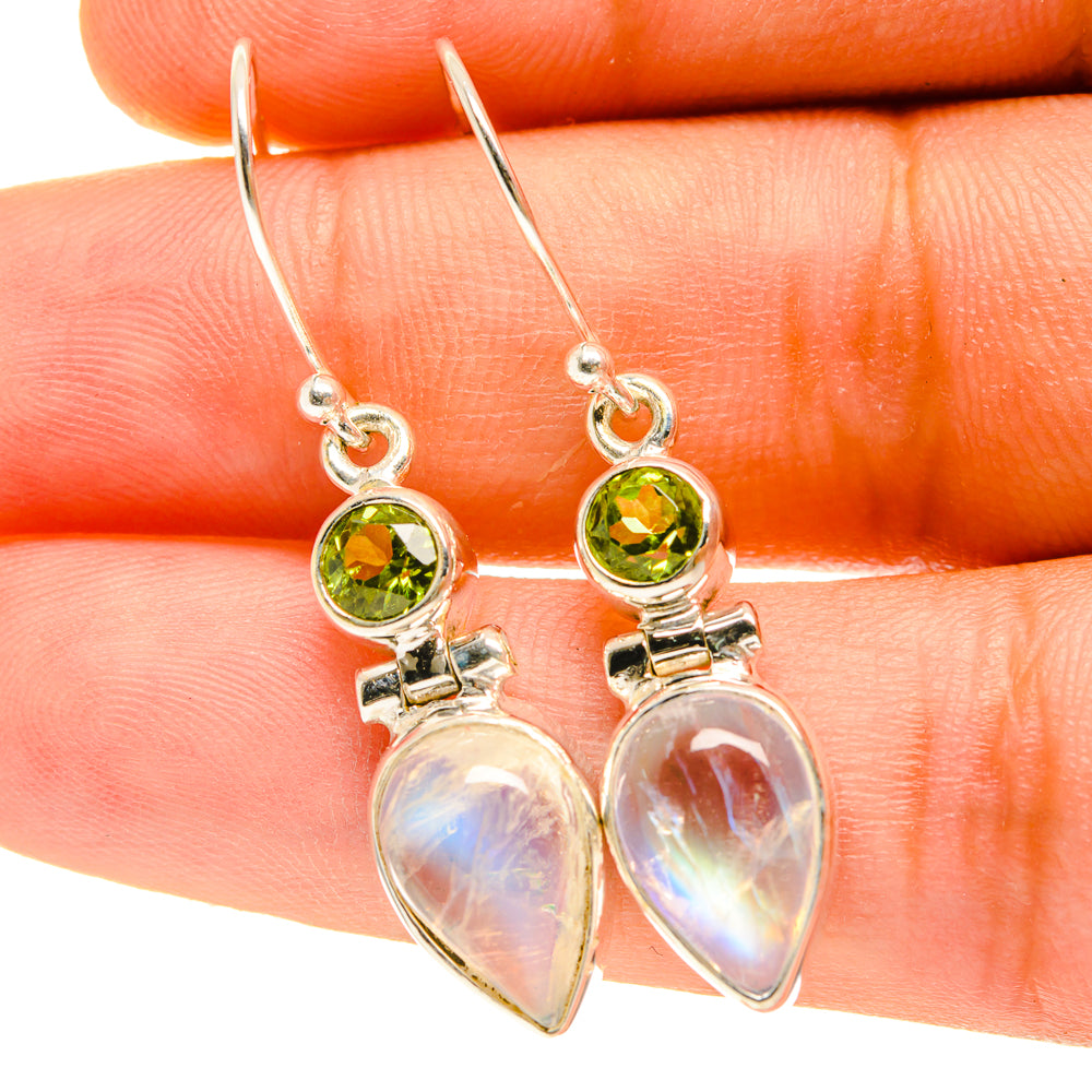Sterling silver earrings with green peridot and iridescent teardrop moonstone drops