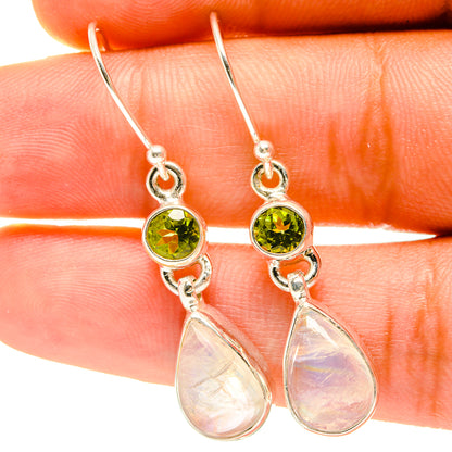 Sterling silver drop earrings with green peridot stones and opal-like teardrop dangles