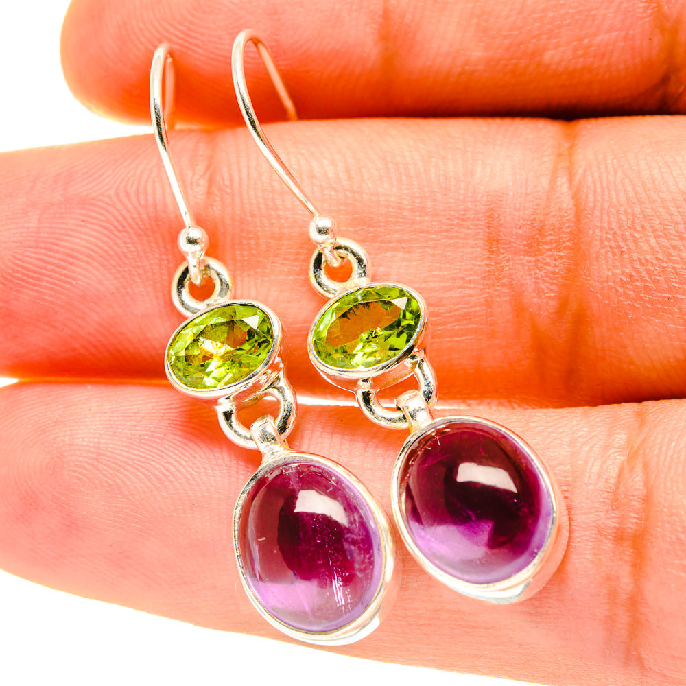 Amethyst and peridot drop earrings on silver hooks, green and purple oval gemstones