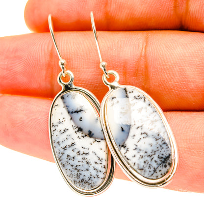 Dendritic opal earrings, oval white cabochon with black dendrites, silver hook backs