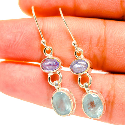 Sterling silver drop earrings with purple and light blue oval stones, lever hooks