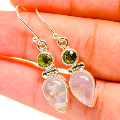 Sterling silver drop earrings with round green peridot and iridescent white moonstone