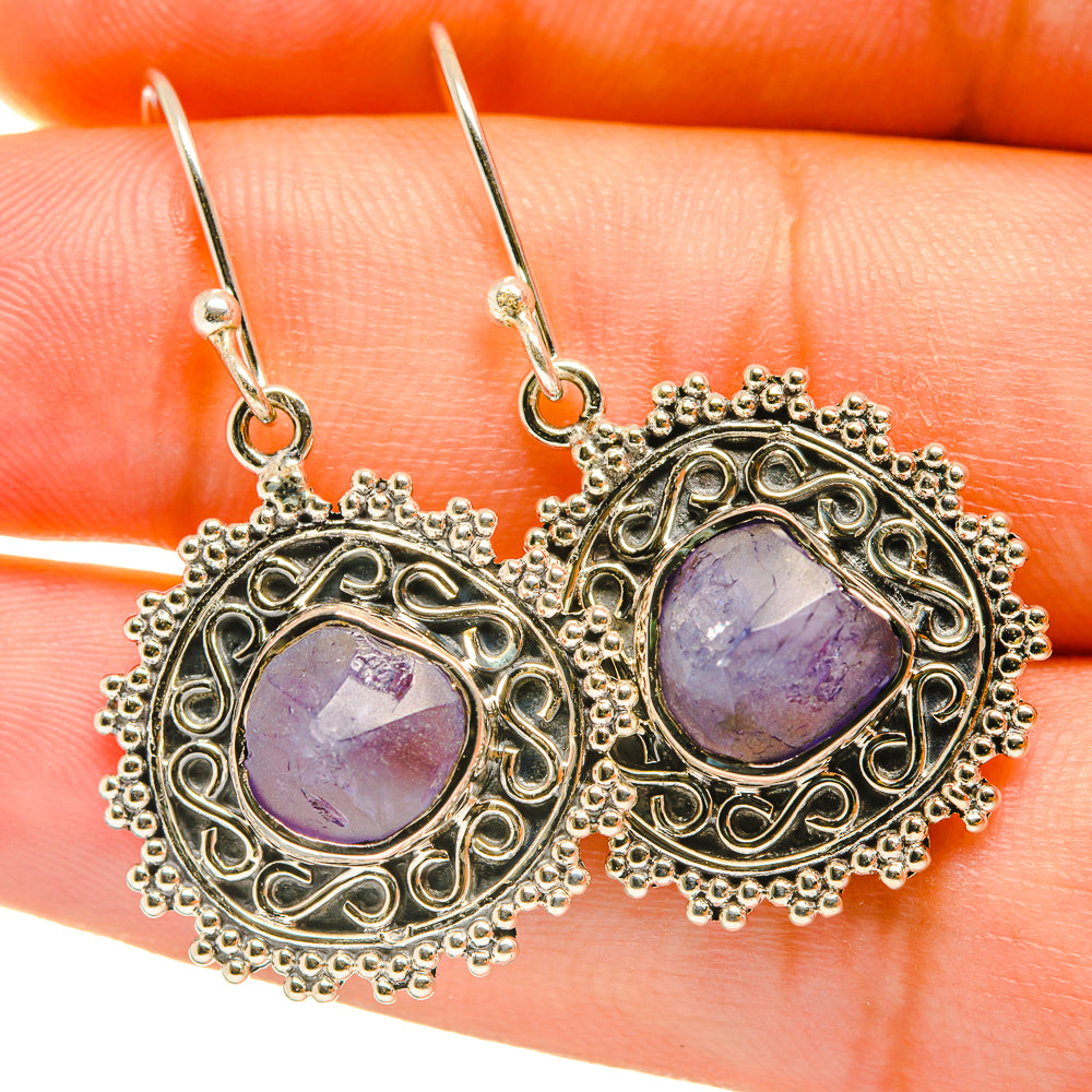 Sterling silver tanzanite earrings with round purple gemstone and ornate filigree hoops