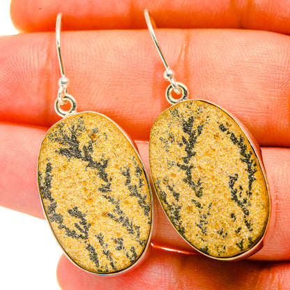 Oval dendrite earrings in yellow with black veining, silver fishhook findings