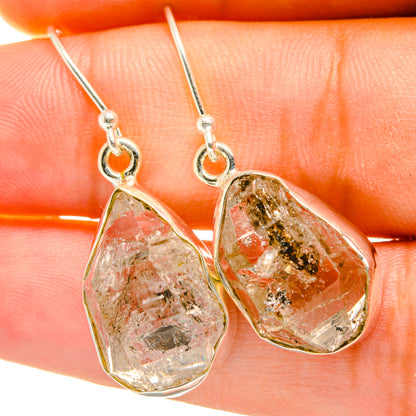 Herkimer diamond drop earrings with faceted clear teardrop stones and sterling silver hooks