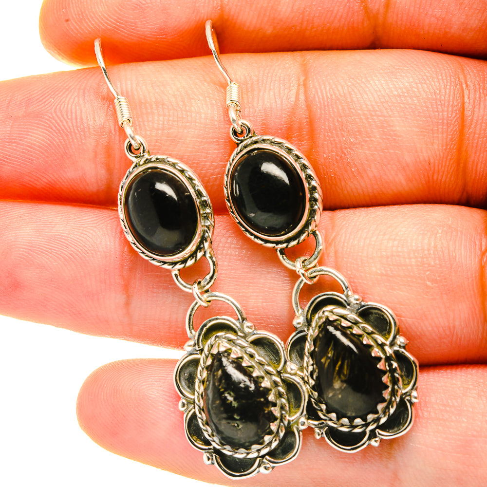 Silver oval black onyx-style drop earrings with three dangling bezel stones