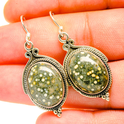 Sterling silver oval Ocean Jasper drop earrings with green speckled cabochons, ornate frames