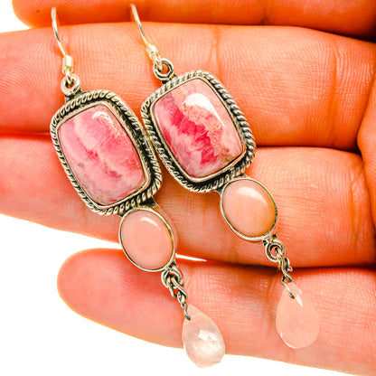 Silver drop earrings with pink rectangle stone, orange cabochon, and peach teardrop