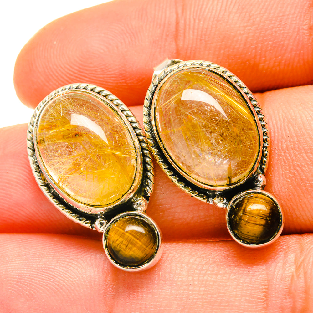 Oval tiger eye drop earrings with gold-tone bezel and round tiger eye dangles