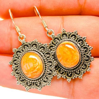 Filigree drop earrings with orange agate cabochon and gold-tone hooks