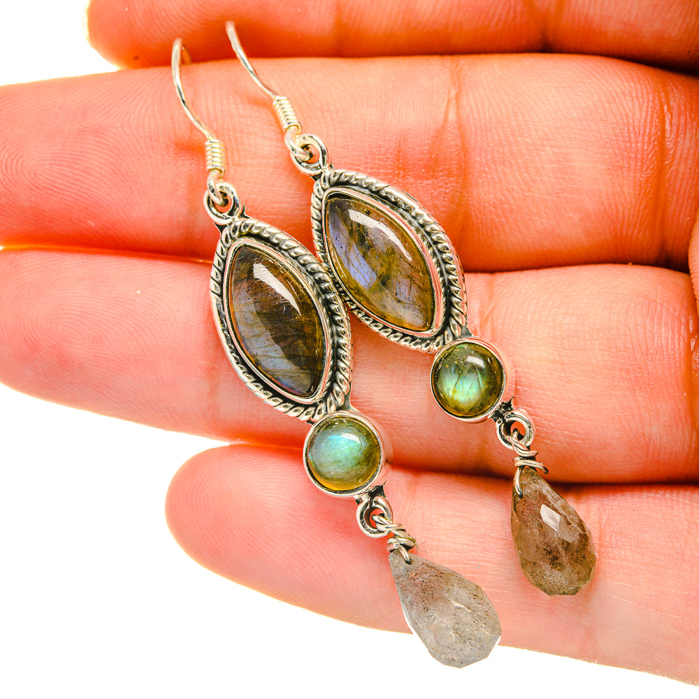 Sterling silver labradorite drop earrings with oval stones, green accents, and crystal dangles