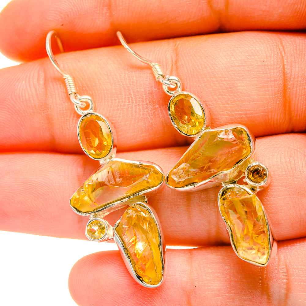 Rough citrine sterling silver drop earrings with faceted yellow stones and silver hooks