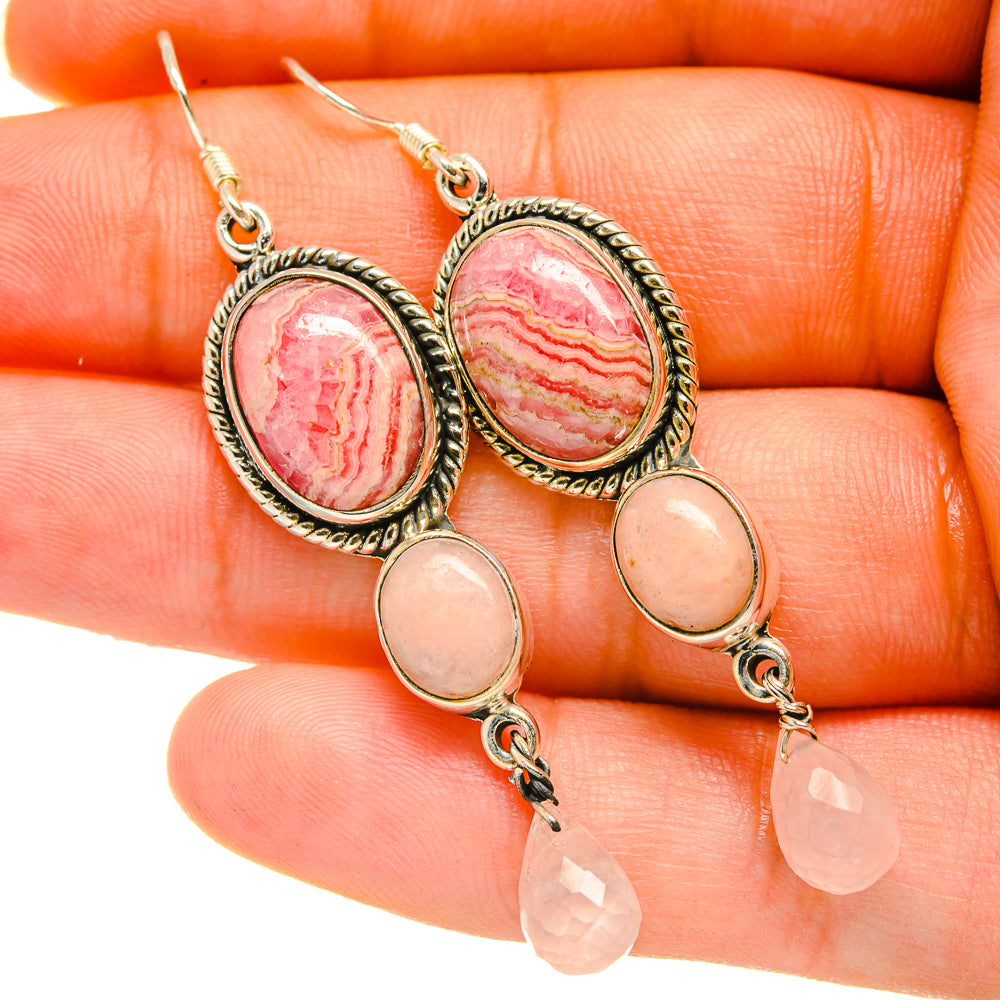 Oval pink and red stone earrings with pink opal drops and ornate gold-tone bezels