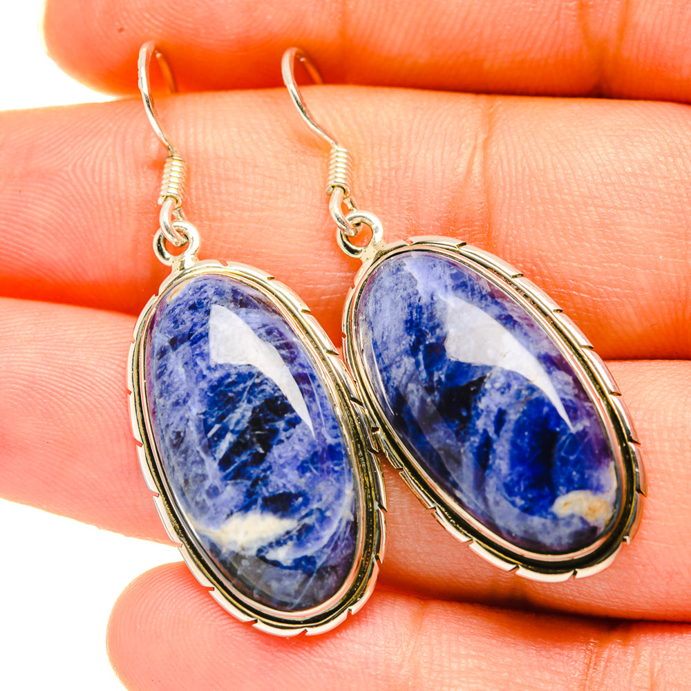 Oval sodalite drop earrings with blue stone and silver-tone wire and loop frames