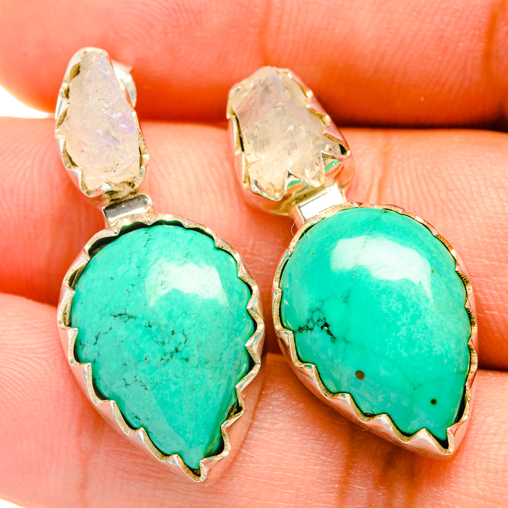 Turquoise rough oval dangle earrings in silver with clear stone caps