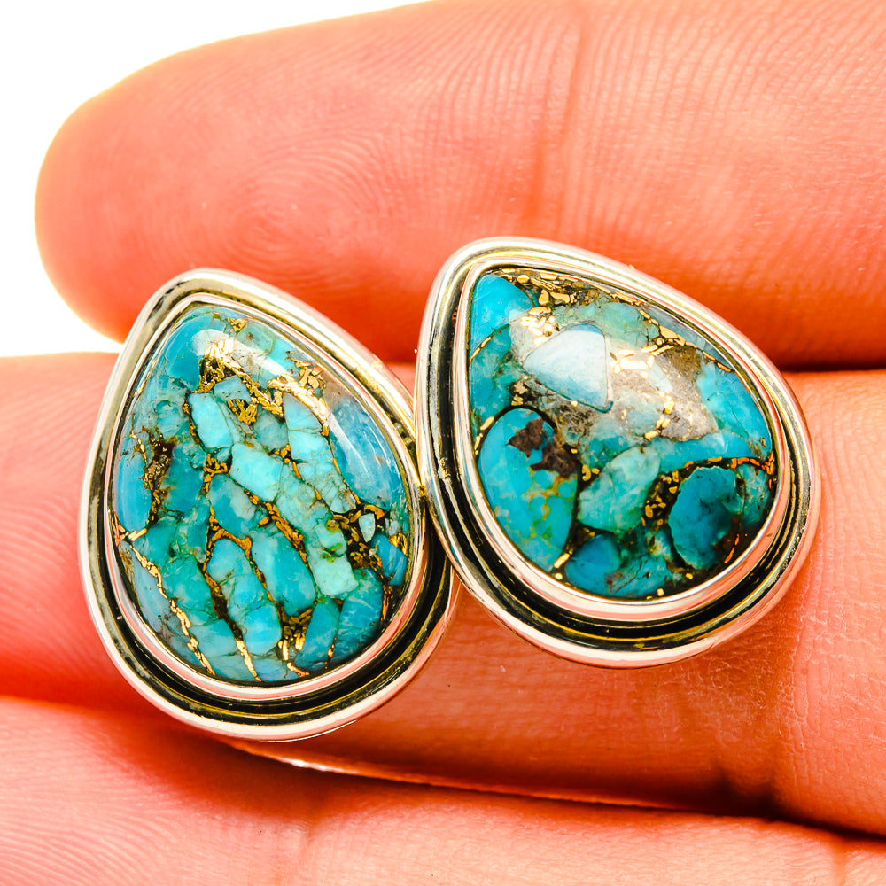 Sterling silver turquoise teardrop stud earrings with blue-green stone and golden matrix