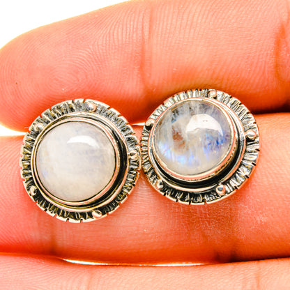 Moonstone stud earrings with round bezel and textured sterling silver frame