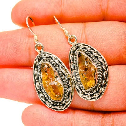 Rough citrine and 925 sterling silver oval drop earrings with ornate rope edge setting