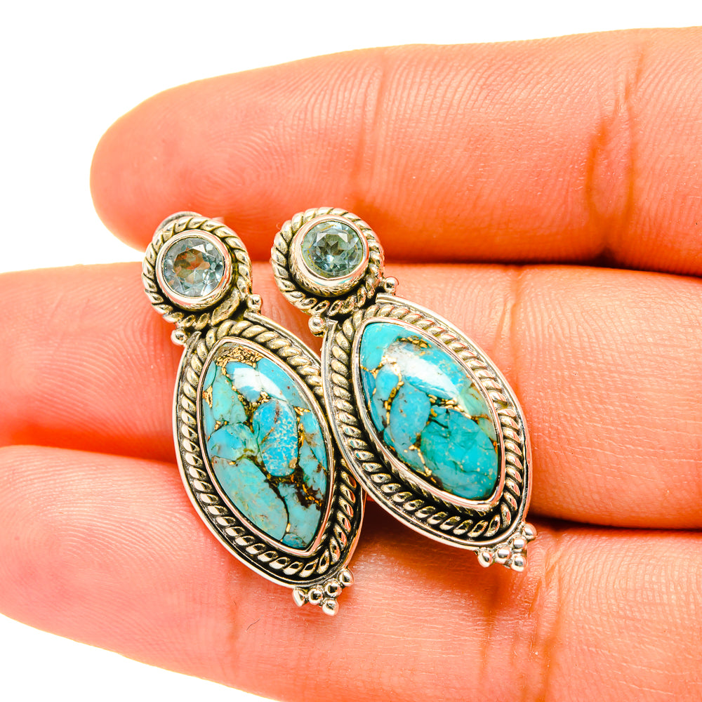 Turquoise oval drop earrings with round blue stone tops, gold-tone filigree, lever backs