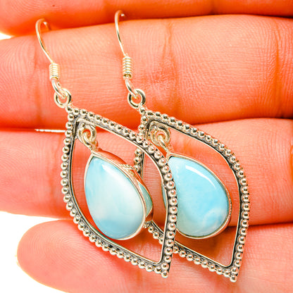 Teardrop larimar-style gemstone drop earrings with ornate silver-tone frames