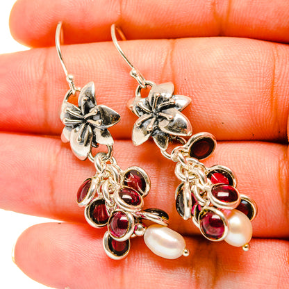 Silver drop earrings with flower charm, red garnet stones, dangling pearls