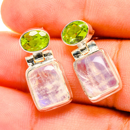 925 sterling silver earrings close-up: oval green peridot with pale lavender moonstone
