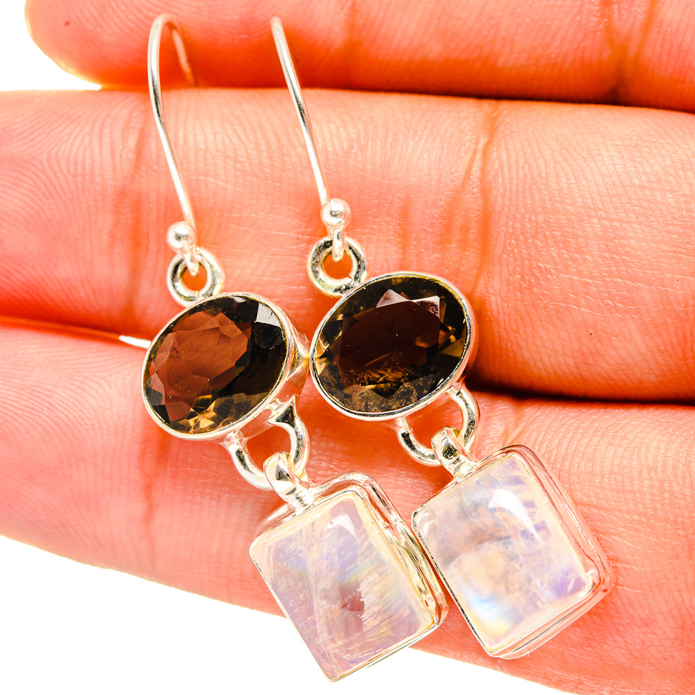 Sterling silver earrings with faceted dark round stones and square iridescent moonstone beads