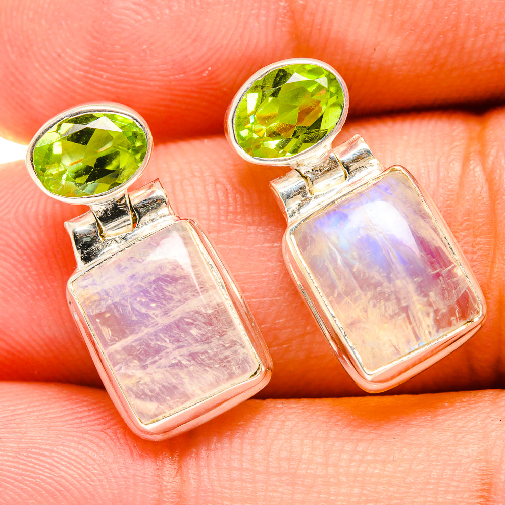 Sterling silver earrings with green peridot studs and iridescent rectangular drop dangles