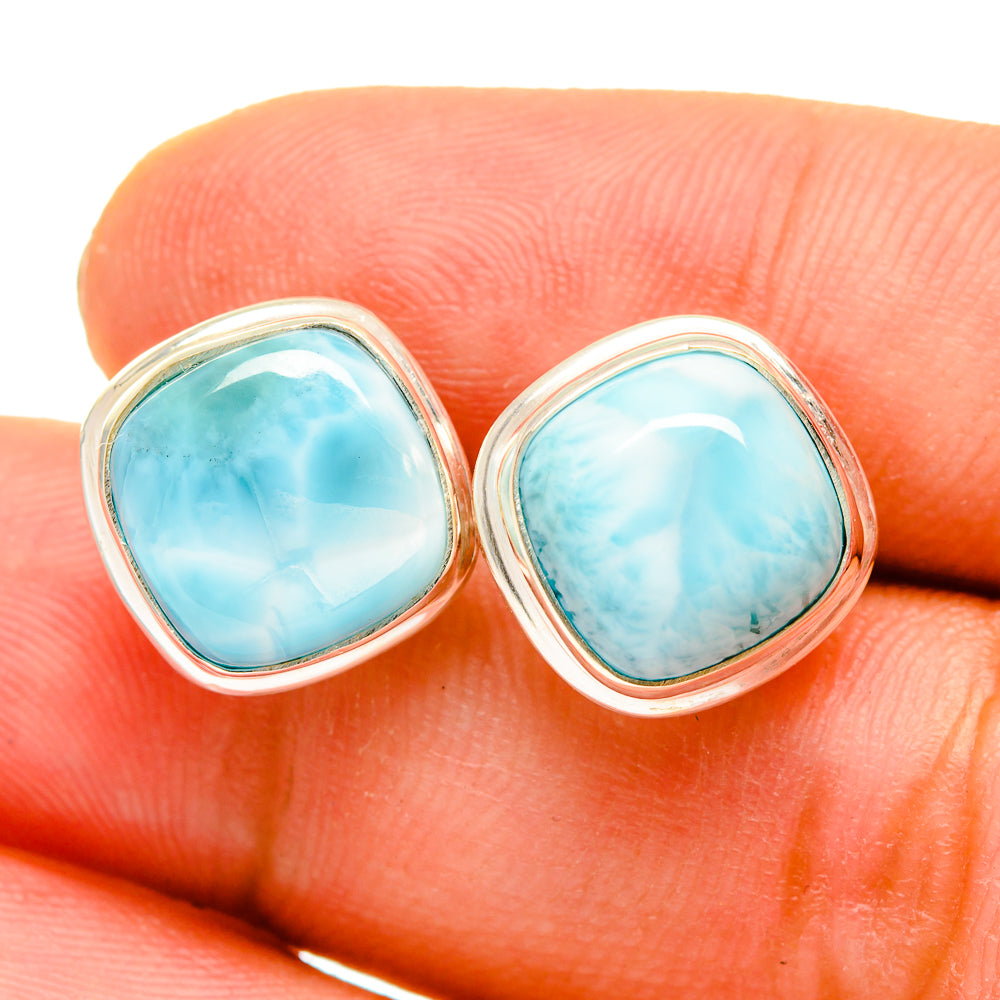 Oval Larimar cabochon stud earrings with silver bezel and turquoise blue stone