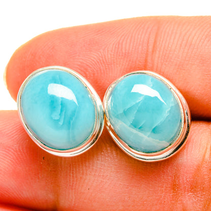 Larimar stud earrings close-up, 925 sterling silver with round turquoise blue stones
