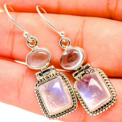 Sterling silver drop earrings with pink-purple opalescent square stones and round tops