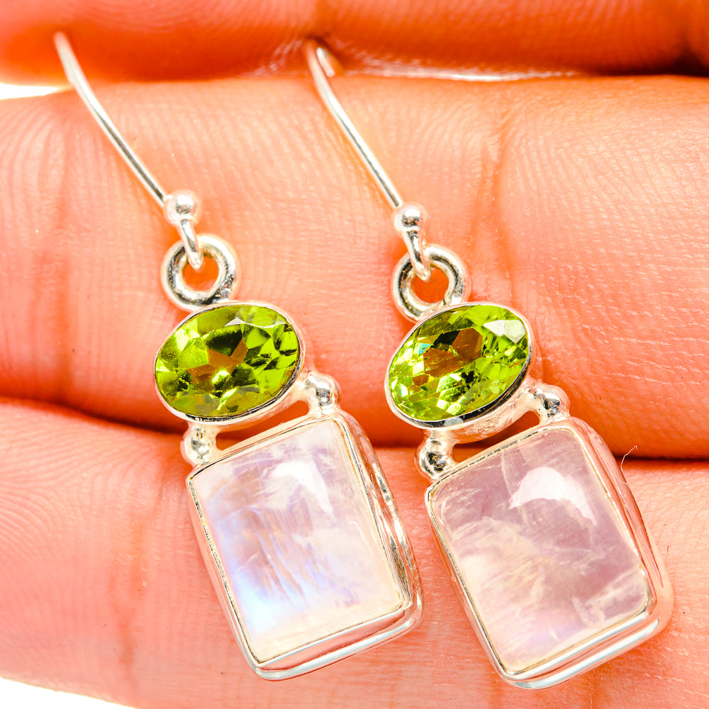 Peridot and moonstone drop earrings with green oval tops and iridescent light pink rectangles