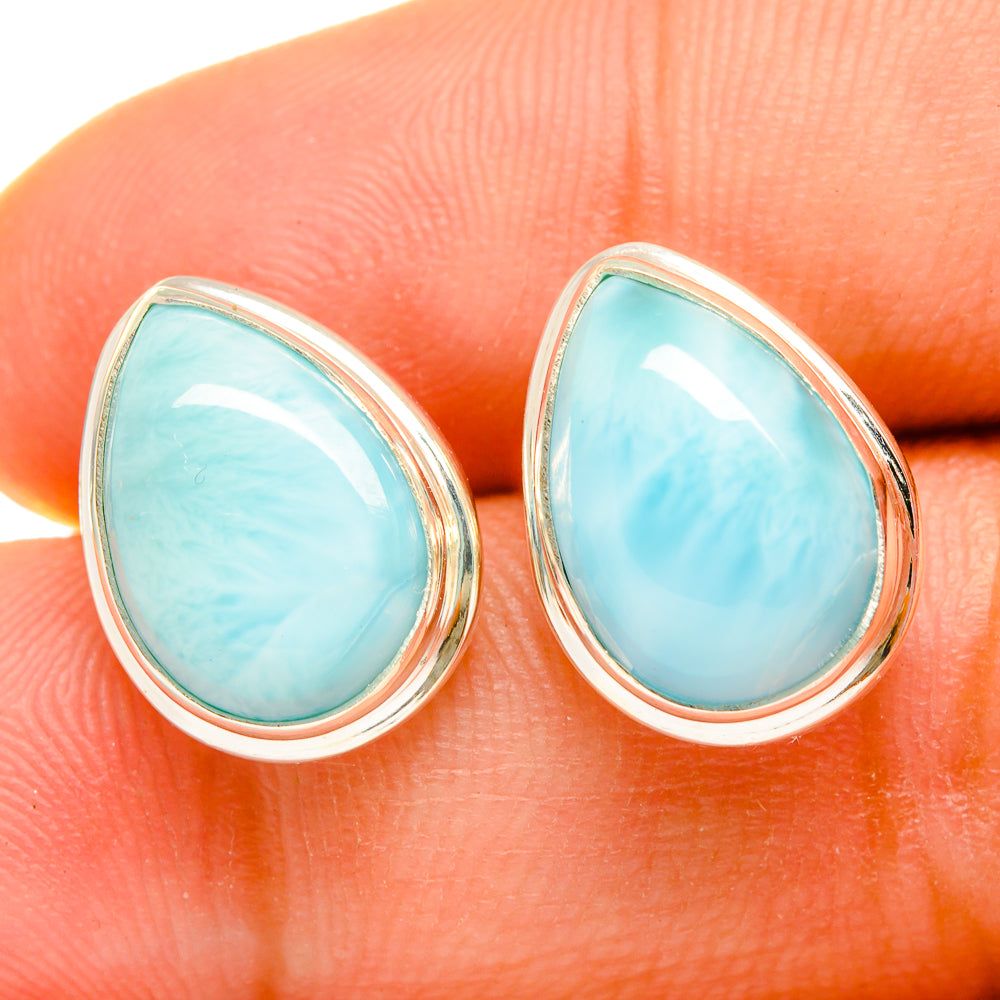 Larimar earrings close-up, oval turquoise cabochon bezel with 925 sterling silver frame
