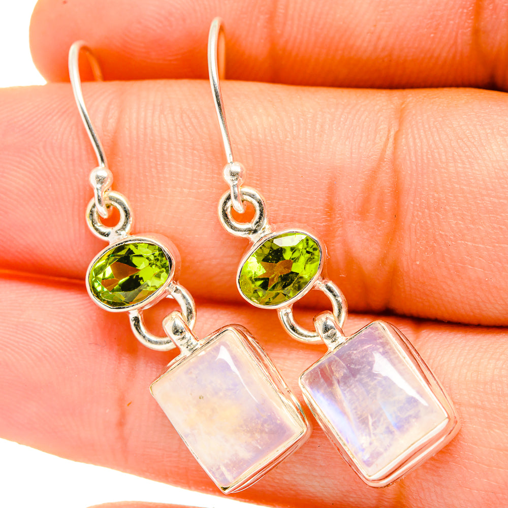 Peridot and moonstone drop earrings, silver hooks with green stones and opal rectangles