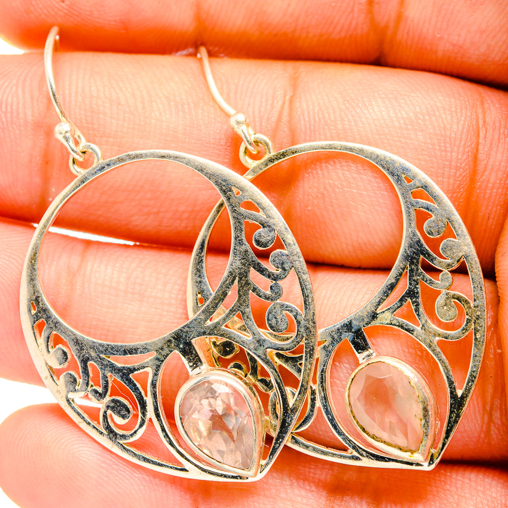 Rose quartz drop earrings with silver filigree hoops and heart-shaped pink gemstones
