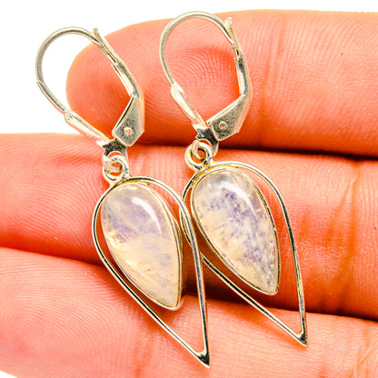 Teardrop gemstone drop earrings on silver-tone hooks with purple-white shimmer stone