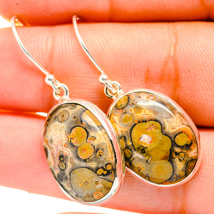 Sterling silver poppy jasper oval drop earrings, close-up of yellow orange speckled stone