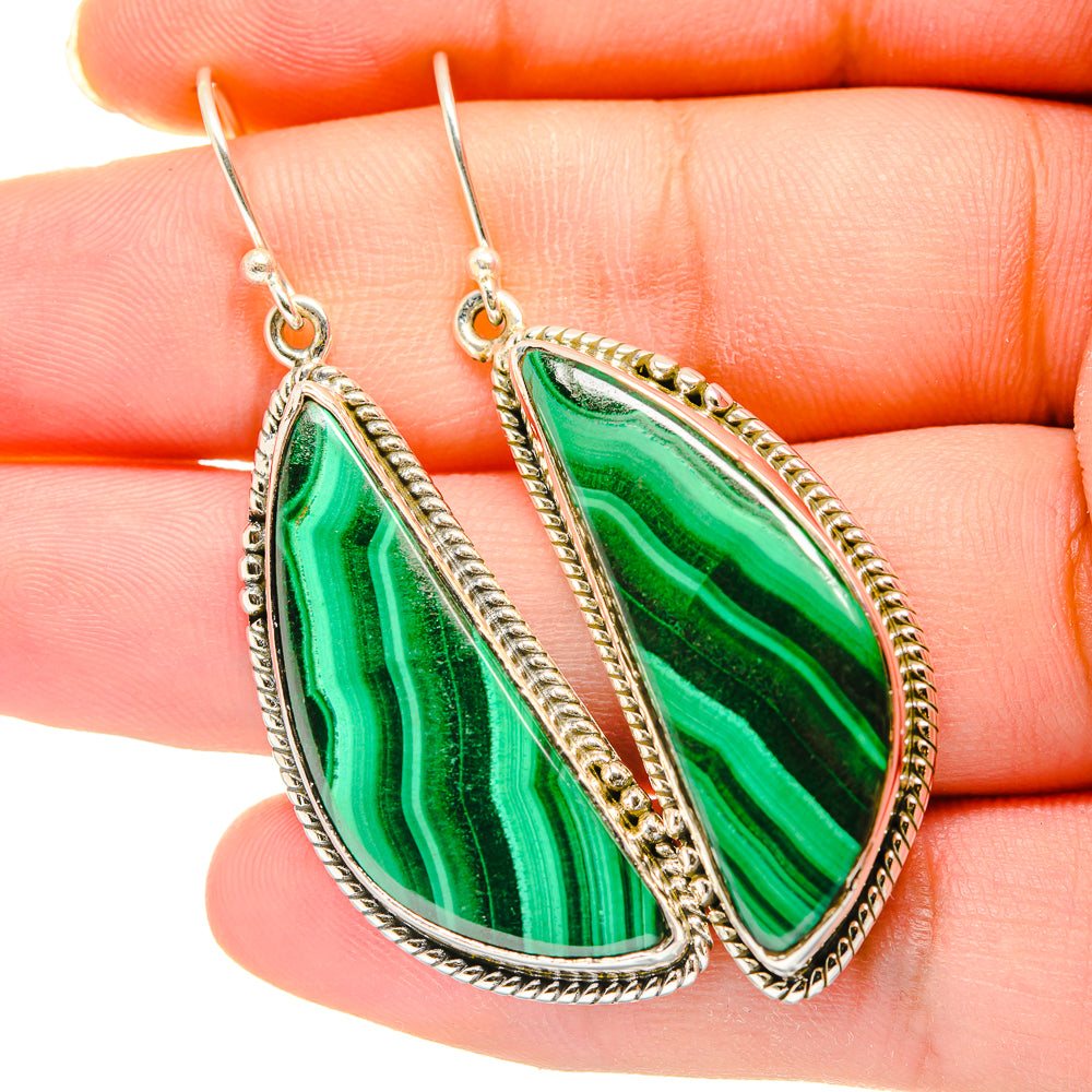 Oval malachite earrings with green striped stone drops and ornate sterling silver frames