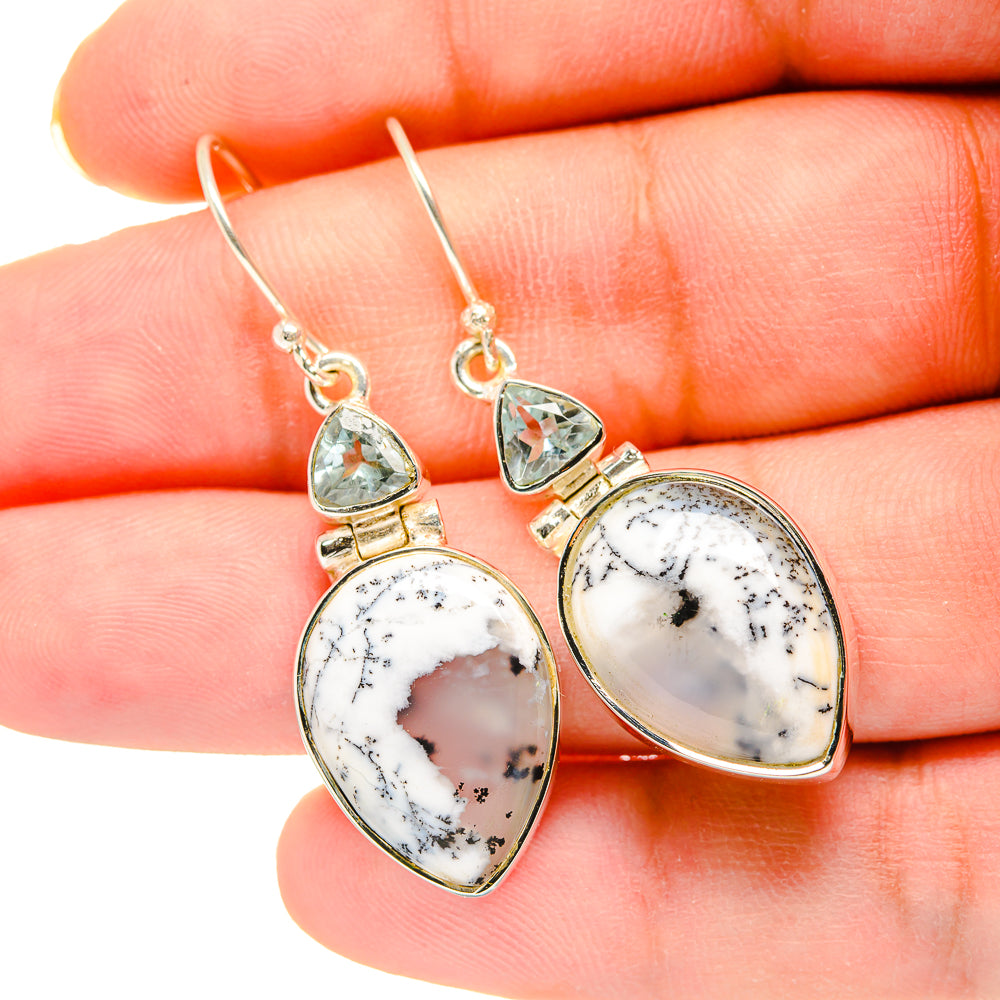 Pear drop earrings in sterling silver with dendritic opal centers and blue topaz top stones