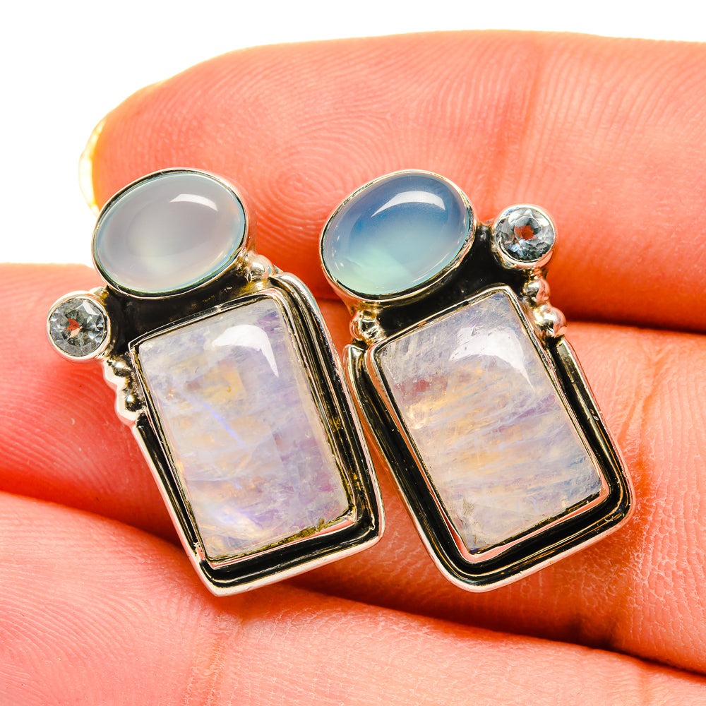 Sterling silver earrings with square opal-like stones and aqua cabochon accents