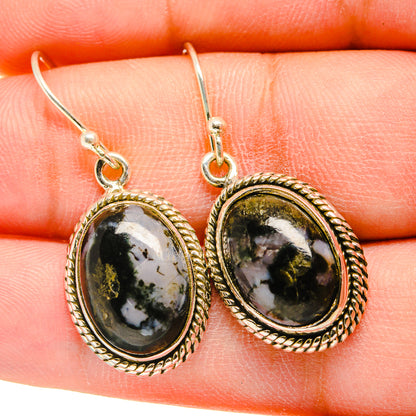 Close-up of oval gabbro stone earrings with rope bezel, 925 sterling silver hooks