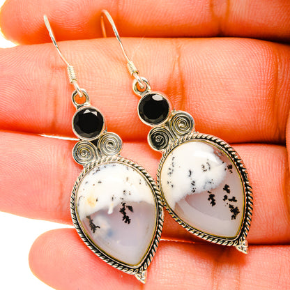 Dendritic opal earrings with black onyx teardrop stones and ornate silver filigree hooks
