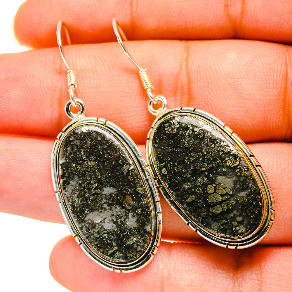 Oval pyrite agate drop earrings in silver tone with hook backs, greenish black stone