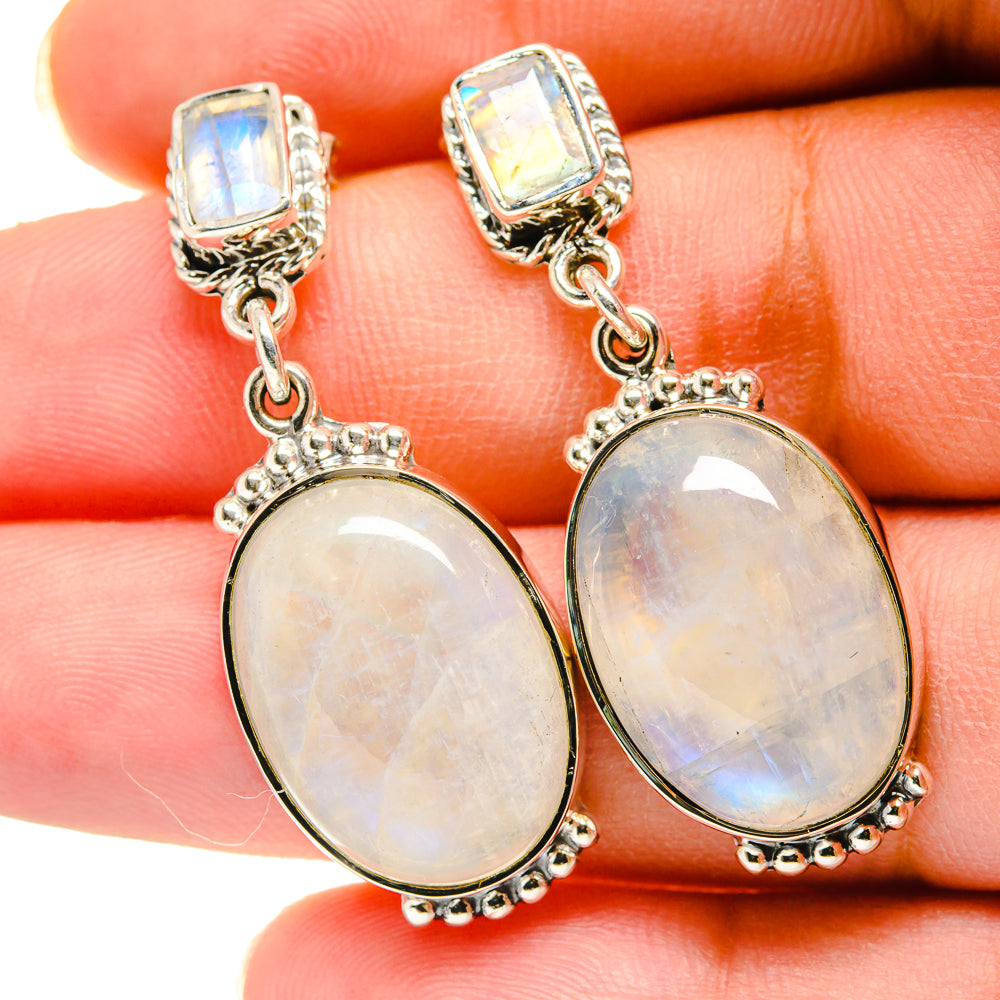 Sterling silver moonstone drop earrings with oval opalescent stones, dangling chains