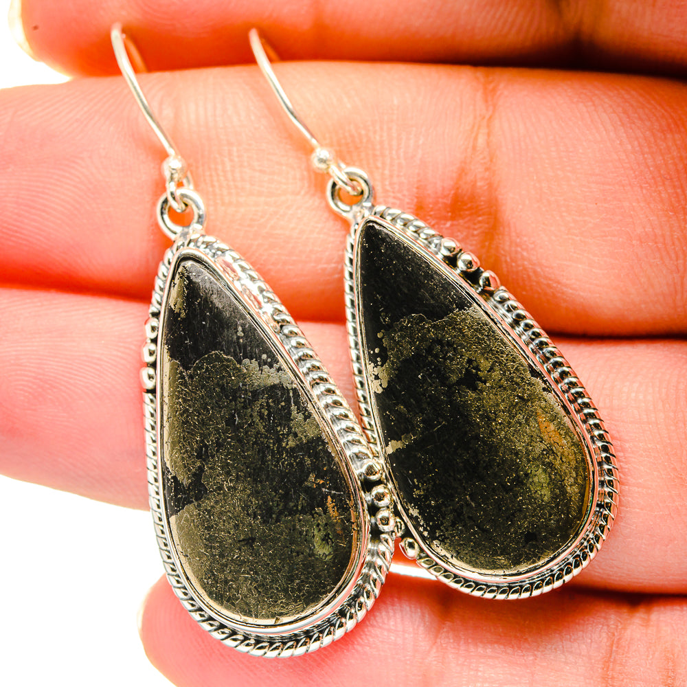 Sterling silver teardrop pyrite agate earrings with textured bezel, fishhook backs